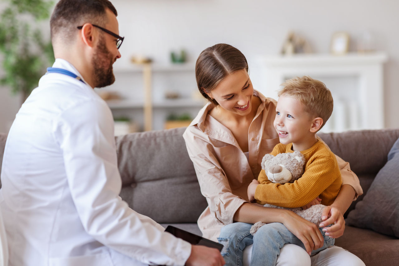 Mother and child at a consultation with GP